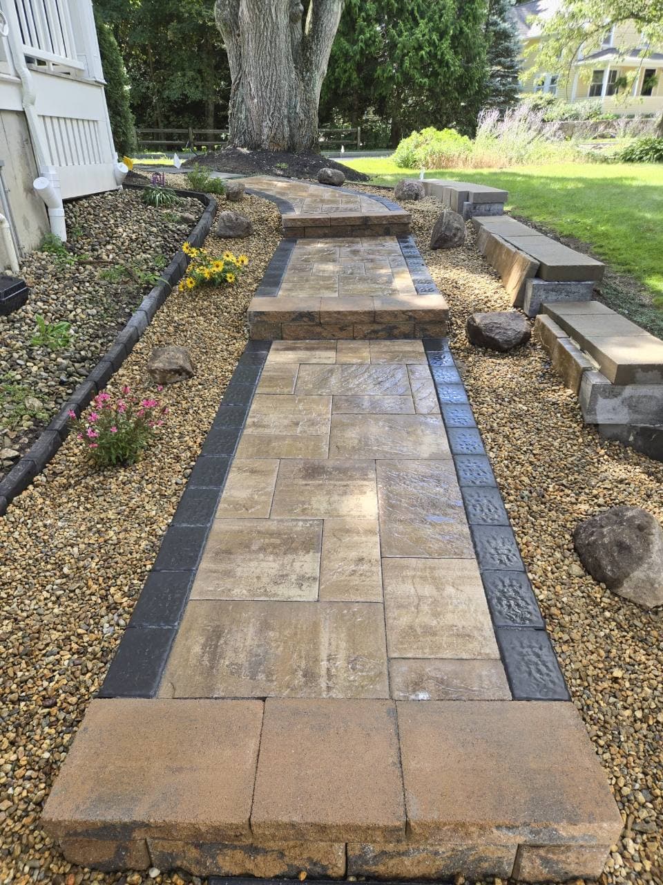 Walkway and outdoor steps beside the house in Needham, MA