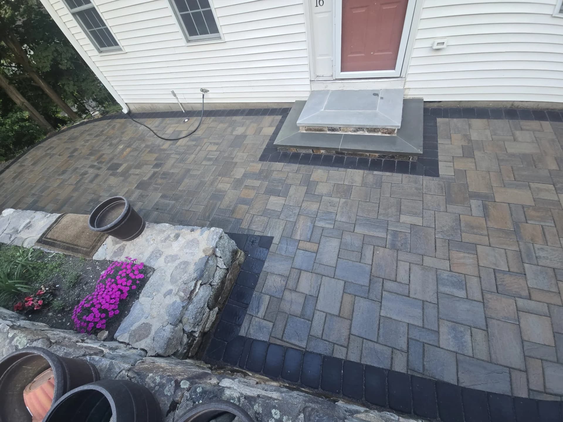Patio paving pattern around the entrance steps in Hudson, MA