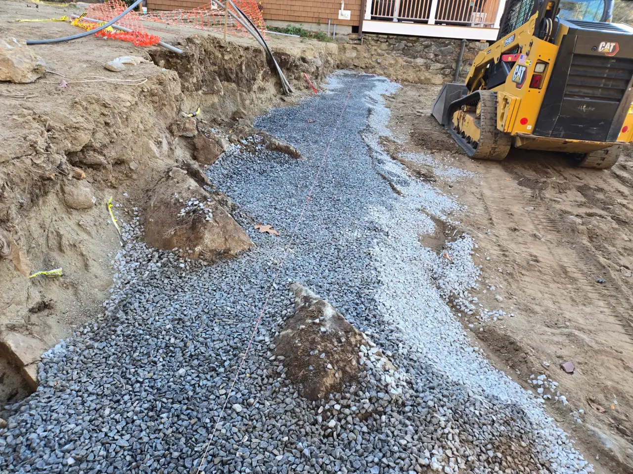 Gravel foundation preparation for retaining wall